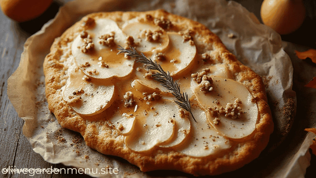 Pear and blue cheese flatbread topped with walnuts and honey drizzle.